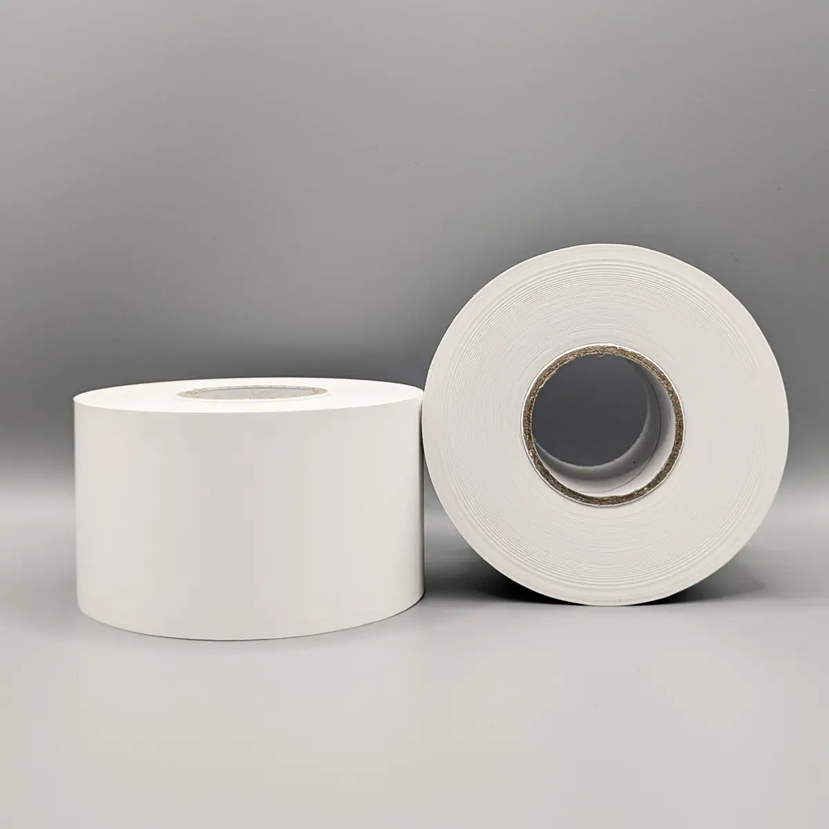 Linerless Endlosetikett 58 mm x 80 m gestapelt Linerless Endlosetikett 58 mm x 80 m gestapelt