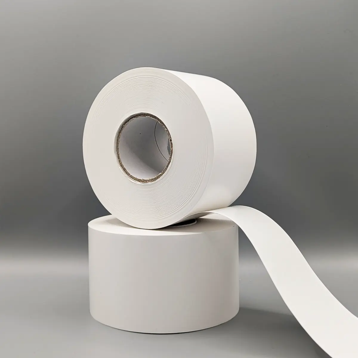 Linerless Endlosetikett 58 mm x 80 m gestapelt Cover Linerless Endlosetikett 58 mm x 80 m gestapelt Cover