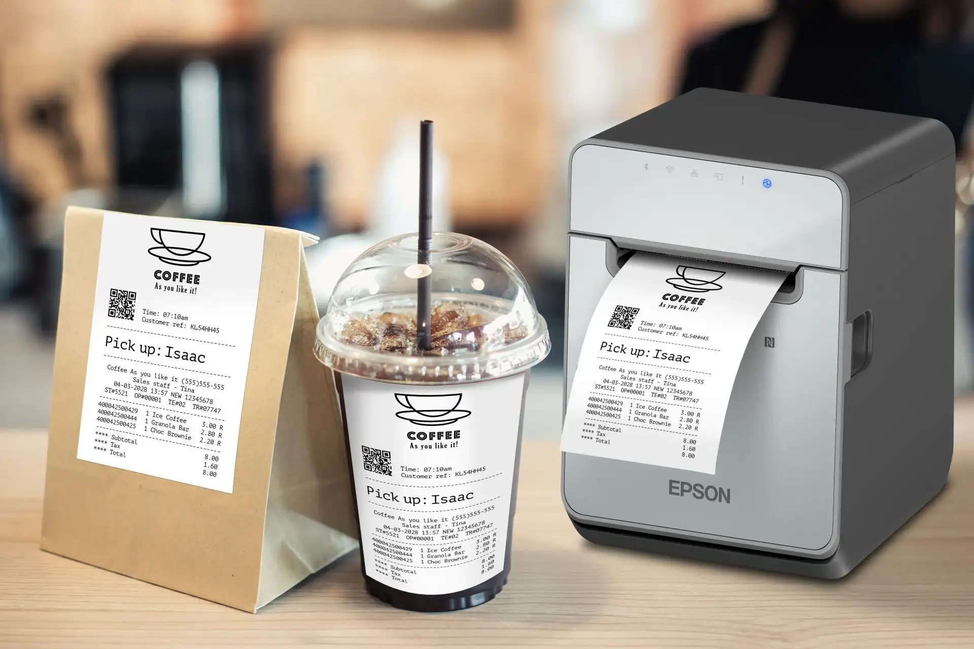 Etikettendrucker von Epson TM-L100 mit USB, seriellem & Ethernet Anschlüssen von vorne rechts mit Bon als Livebild